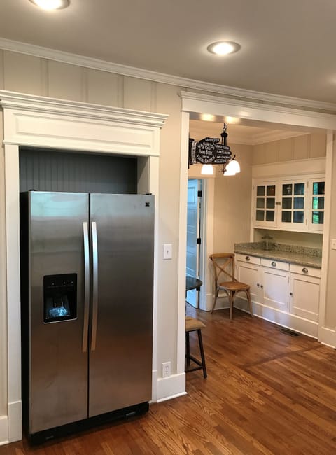 Another view of kitchen with Butler’s pantry in background