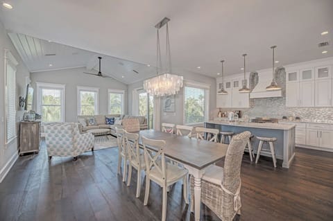 Living, Dining and kitchen with Large windows flooding to main living space with natural lighting all day