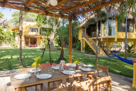 BBQ area view to the gardens and villa