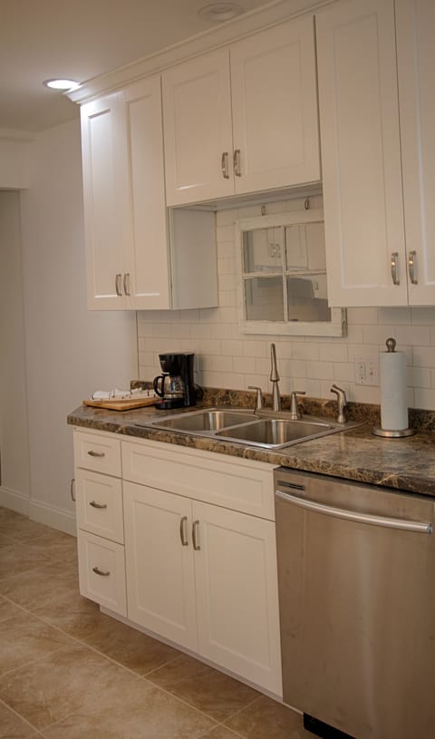 Full kitchen with all cooking utensils and dishes