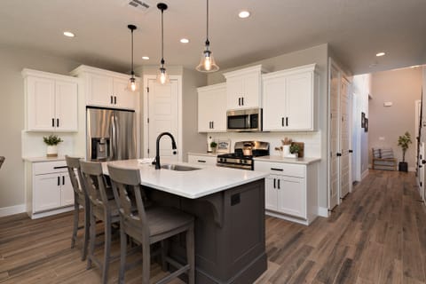 Kitchen Island - The Kitchen Island comfortably seats 3 adults and creates a great space for serving and preparing meals.