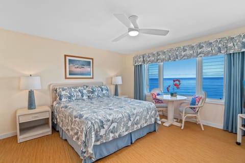 Enjoy magnificent ocean, sunrise & sunset views, from Primary Bedroom's  bed.