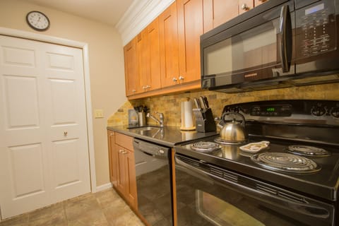 KItchen with cherry cabinets, granite countertops & new appliances