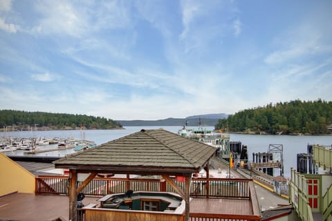Enjoy the comings and goings of the ferry traffic while enjoying a morning cup of coffee from this balcony at the Northwest Passage. NOTE: Deck in picture is a restaurant on top of another building.