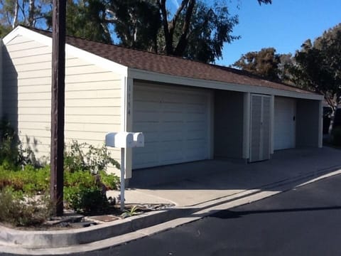 Detached garage in front of house
