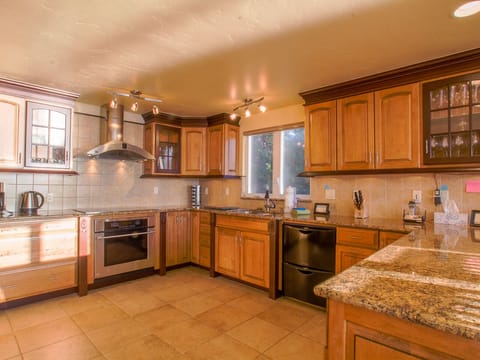 Main kitchen is fully stocked and has water views on the main floor (second floor). Enjoy making dinner and watching the sunset from this spectacular home on the westside of San Juan Island.