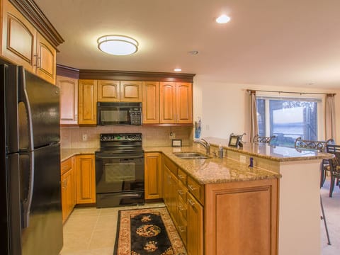 The second kitchen located on the first floor (downstairs) makes for a perfect wet bar or space to hold the beverages and extra snacks.