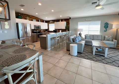 Open concept living space- all with a view of the beach and acce - Open concept living space- all with a view of the beach and access to the top floor, private balcony.