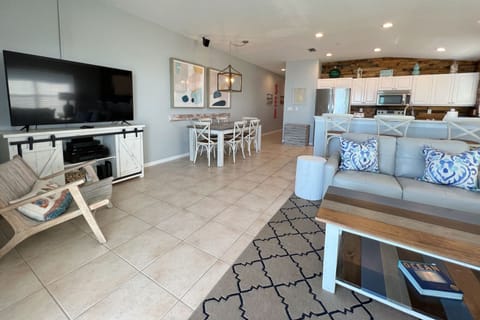 View of the living room, dining room, and kitchen from the balco - View of the living room, dining room, and kitchen from the balcony.