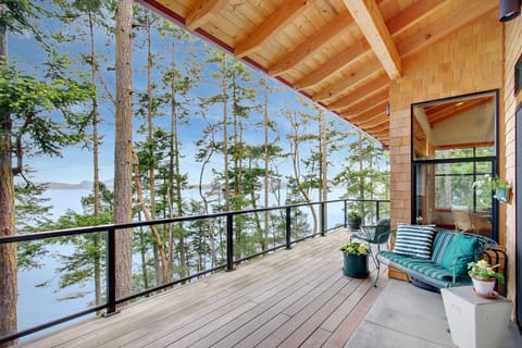 Waterview deck off of the living room, kitchen, and primary bedroom. 

*This house is not suitable for small children due to high bank waterfront and loft style bedroom*

*No Water Access