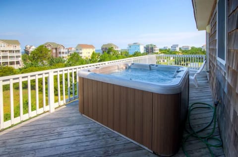 Catch your favorite reality nature shows by soaking in the 6-person hot tub while the sun sets over the sound and the stars begin to dance.