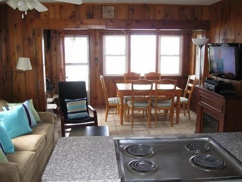 View From Kitchen - Great room, dining, sleeper sofa, TV, with great view of Lake Michigan