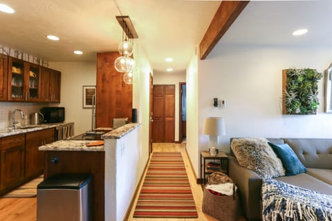 View of Kitchen, Living Room and Hallway to Bedrooms and Bathrooms