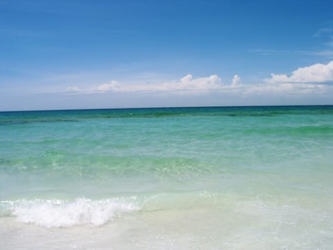 Clear emerald green water and sugar white sands