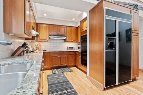 Main Level Kitchen With Double Ovens & Double Stove Tops