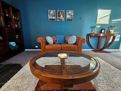 Freshly updated.  The living room has been decorated with a moody vibe