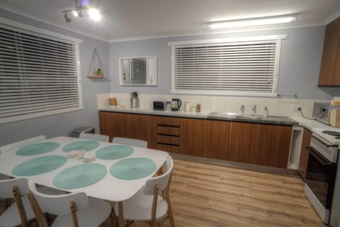 Kitchen complete with standard size Fridge, Oven, Stove, Microwave, Kettle etc