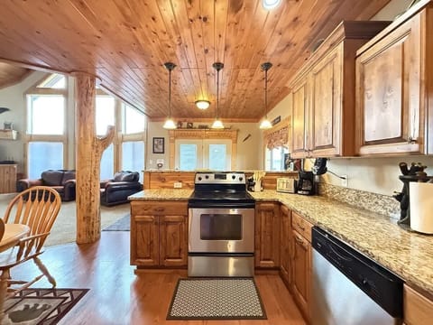 Beautiful open kitchen with stainless steel appliances.