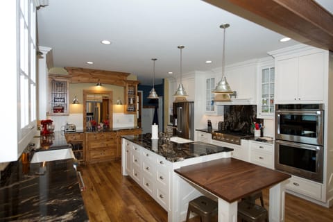 Double over with professional Thermador cooktop. Island seating