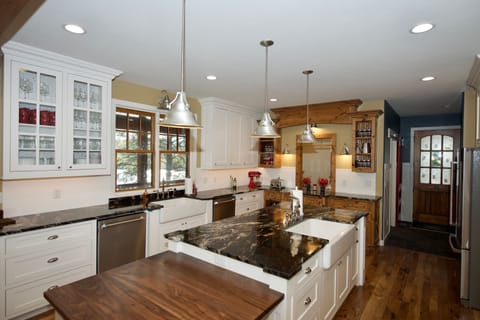 Gourmet Kitchen with 2 Refrigerators, 2 dishwashers, 2 farmhouse sinks.