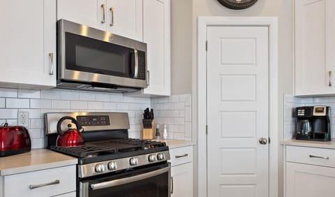 Top of the line appliances featuring a tea kettle