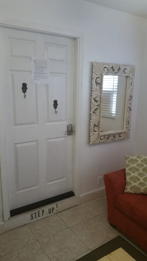 The living room in sunken so there is 1 step down from the entrance