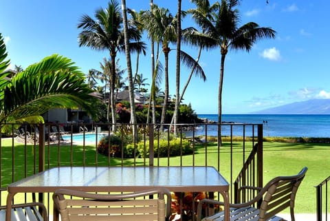View from #114 lanai - The #114 lanai opens to the pool & Honokeana Cove, with Molokai beyond