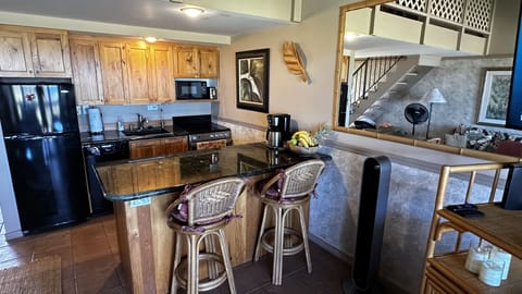 Fully equipped kitchen with microwave and dishwasher.