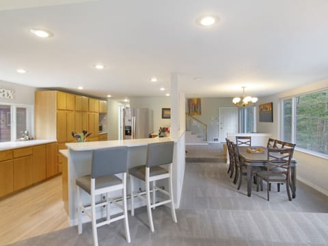Sunken dining room and kitchen.