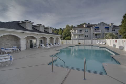 outdoor pool, clean with plenty of chaise or sitting chairs
