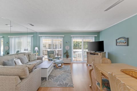 Relax in your bright, airy living space with soothing coastal colors and comfortable seating that flows seamlessly to your private balcony.