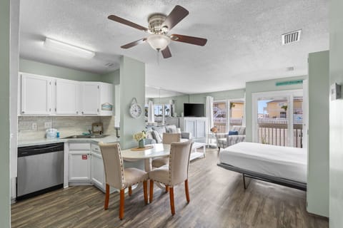 Relax in your bright, airy space where coastal-inspired decor meets modern comfort. Ceiling fans keep you cool while you enjoy meals at your dining table.