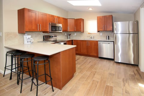 enjoy a nice cup of coffee in our island kitchen 