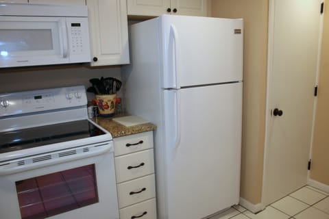 Washer Dryer is in the closet next to fridge.