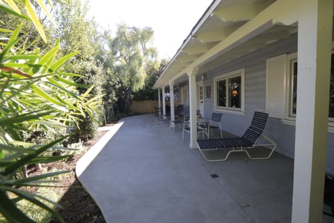 large fenced in private patio at front of house. Kids can play and entertainment