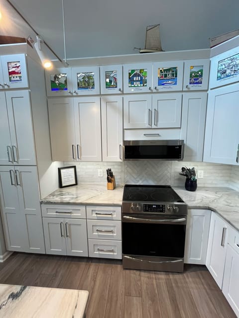 You'll enjoy the original leaded glass windows of Lake Keowee, Dan's hobby.