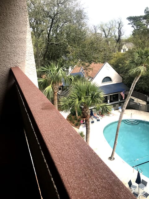 View of welcome center and pool from loft balcony