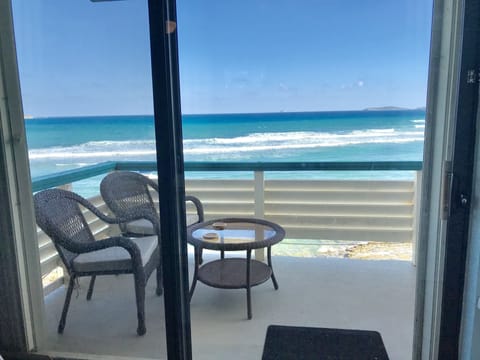 View just outside living room door. All new patio furniture in March 18