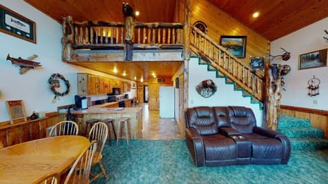 Adjacent to the living room is the dining table and kitchen.