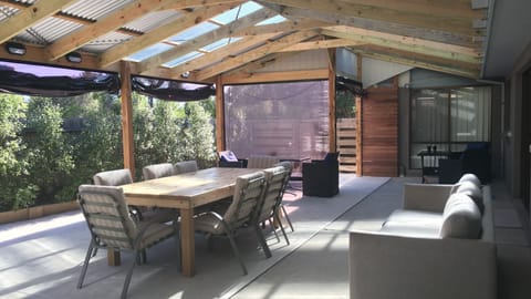 Outdoor HUGE Verandah area. Outdoor Blinds all around. 
