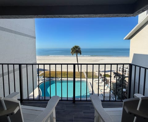 Sit back, relax, and enjoy a beachfront view with a coffee or ha - Sit back, relax, and enjoy a beachfront view with a coffee or happy hour beverage in your hand!