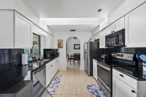 A great new place to get cooking and still view swimmers in the pool.