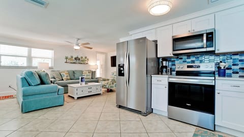 Open concept kitchen and dining.