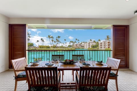 Lanai and View. Teak table easliy fits 6-8 people