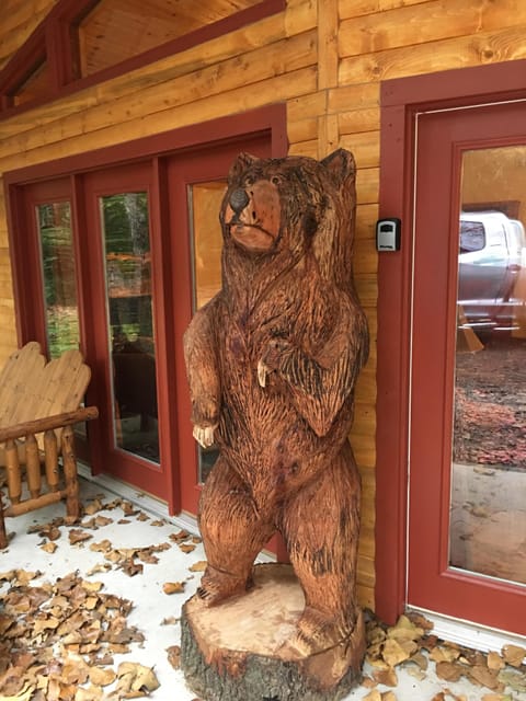Big Bear stands guard over the cabin. 