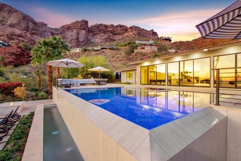 A striking infinity pool, panoramic mountain vistas, and impeccably crafted outdoor spaces come together to create the ultimate desert sanctuary.