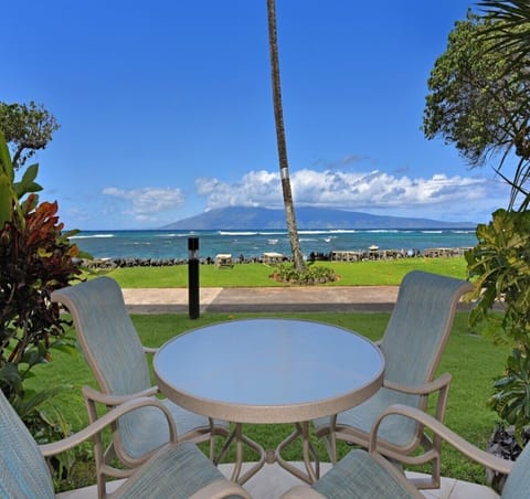 Enjoy alfresco dining with breathtaking views of the turquoise waters right from your balcony