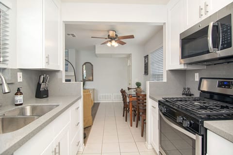 Kitchen view of the entrance and dining nook