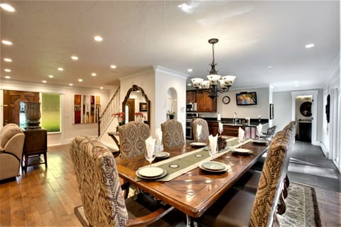 Large Dinning Table Seating for 12 People Addition Chair in the Garage.