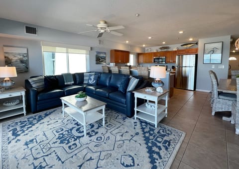 View of the living room, dining room, and kitchen from the balco - View of the living room, dining room, and kitchen from the balcony. The sofa is also a queen sized sleeper sofa.